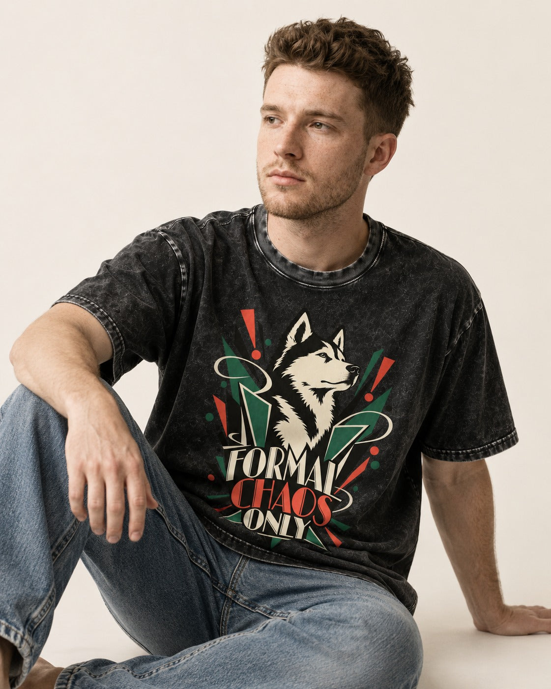 Husky Formal Chaos Only Art Deco Portrait Graphic Washed Tee in Black, worn by a seated model