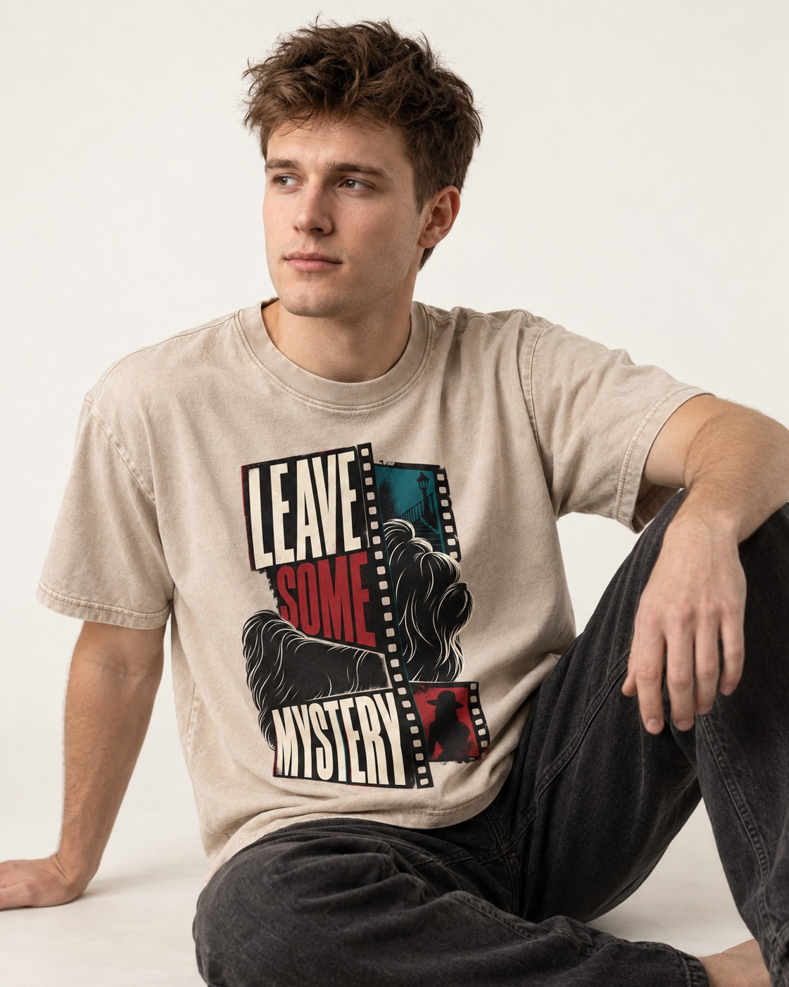 Leave Some Mystery Shih Tzu Washed Tee in Apricot, worn by a seated model