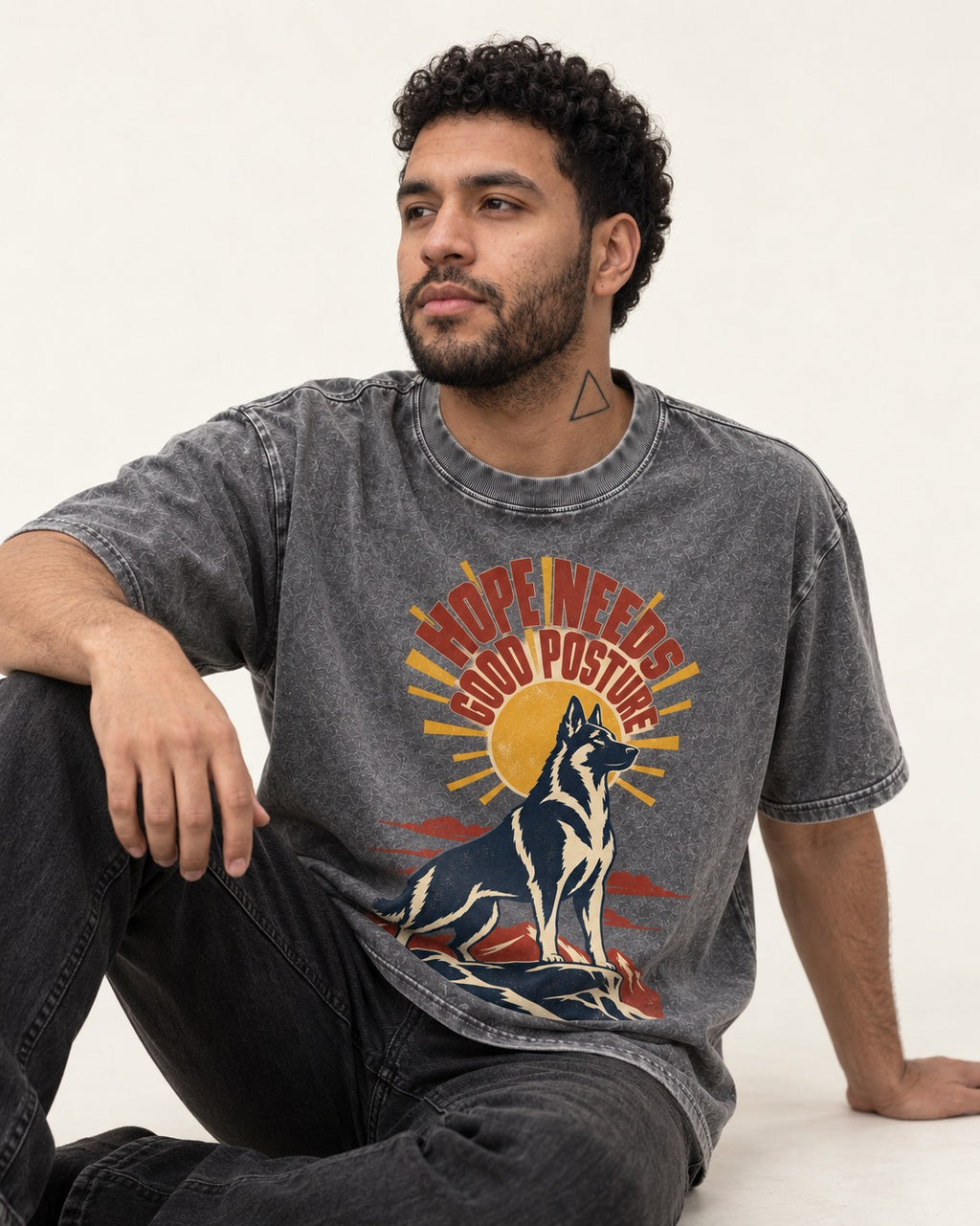 Hope Needs Good Posture German Shepherd Dog Washed Tee in Gray, worn by a seated model