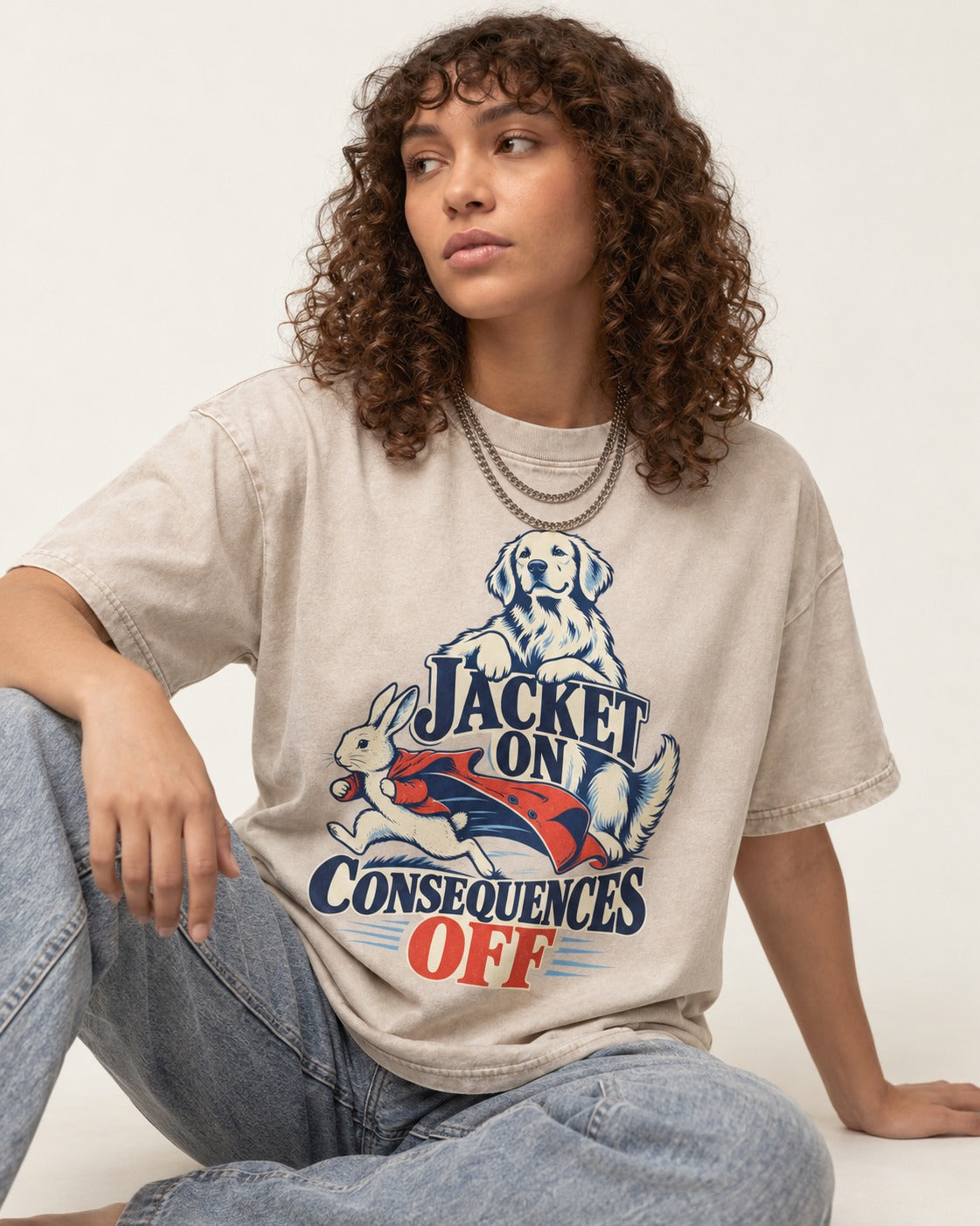 Golden Retriever Jacket On Consequences Off Rabbit Chase Graphic Washed Tee in Apricot, worn by a seated model