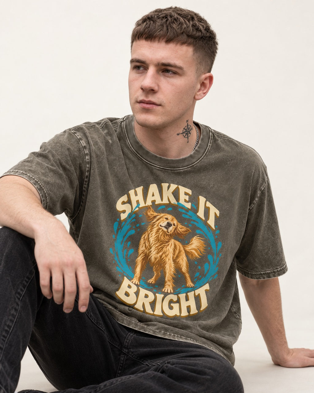 Golden Retriever Shake It Bright Water Ring Graphic Washed Tee in Army Green, worn by a seated model