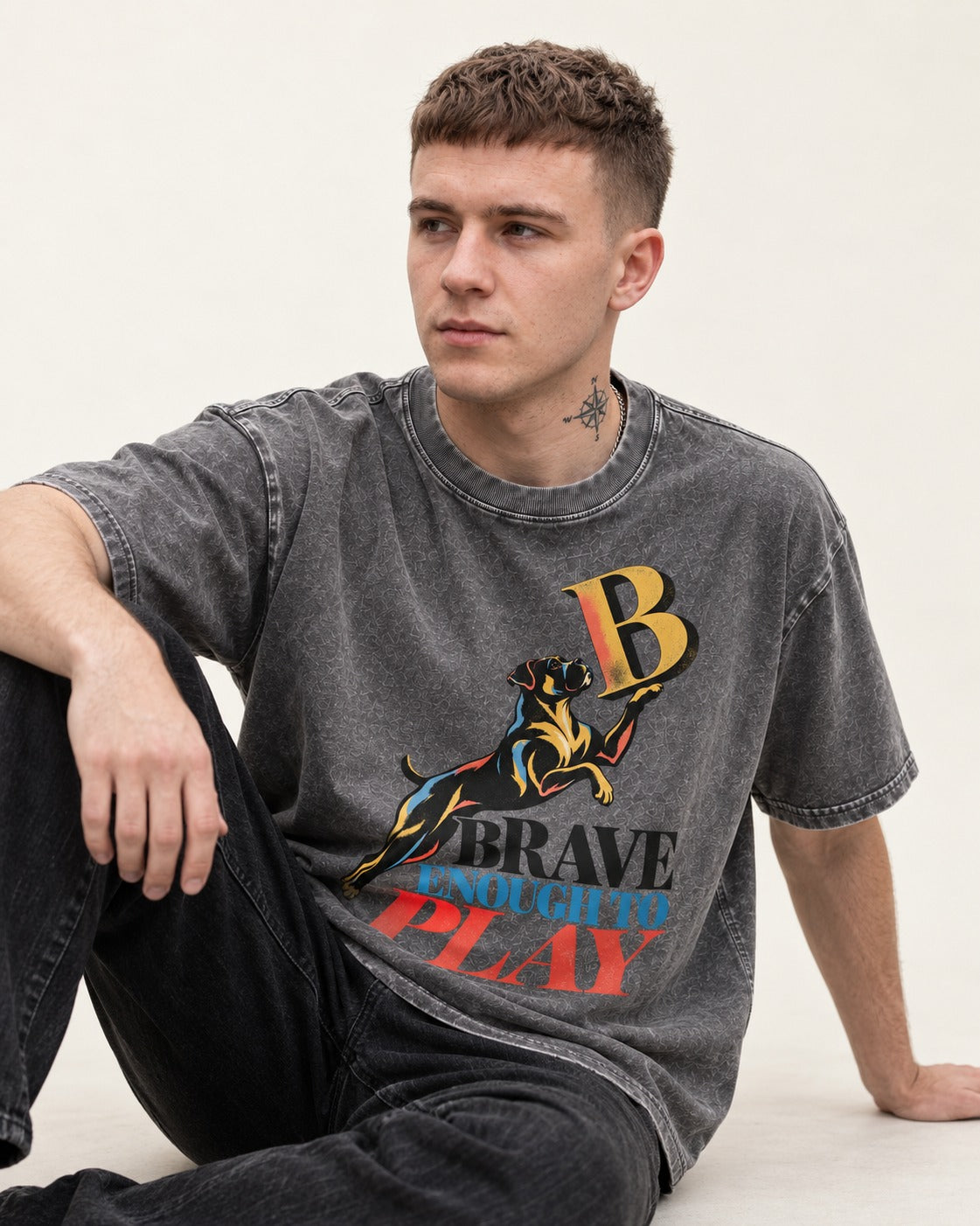 Boxer Brave Enough to Play Washed Tee in Gray, worn by a seated model