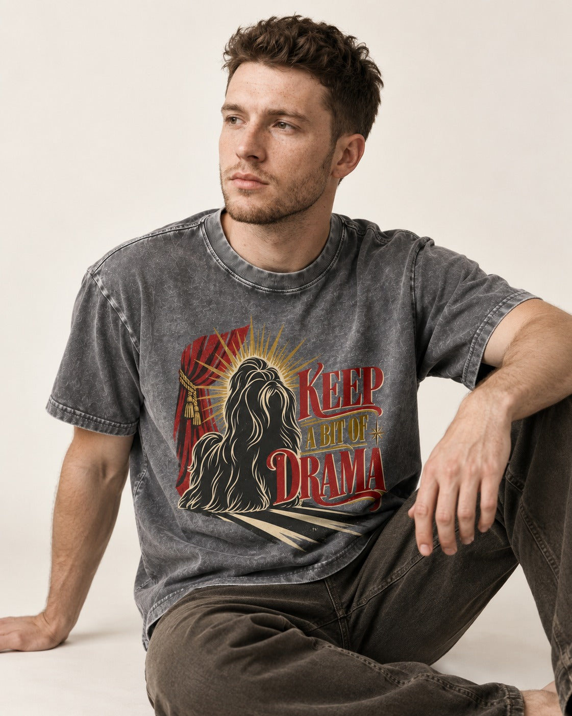 Shih Tzu Keep a Bit of Drama Theater Graphic Washed Tee in Gray, worn by a seated model