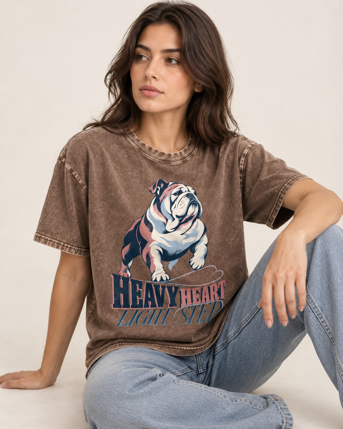 Heavy Heart Light Step English Bulldog Washed Tee in Coffee, worn by a seated model