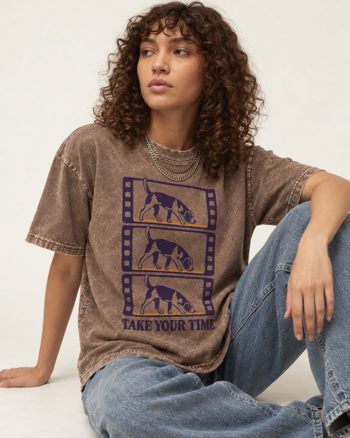 Beagle Take Your Time Washed Tee in Coffee, worn by a seated model