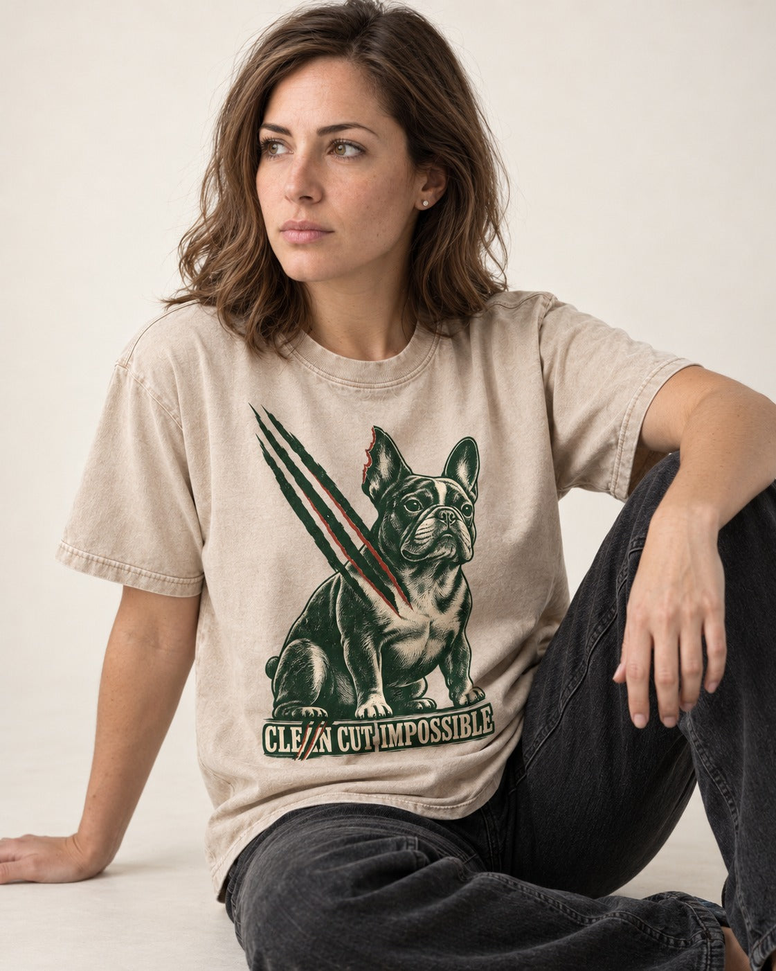 Frenchie Clean Cut Impossible Washed Tee in Apricot, worn by a seated model