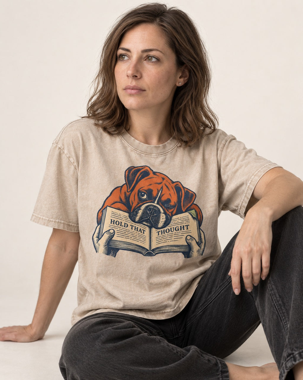 Boxer Hold That Thought Washed Tee in Apricot, worn by a seated model