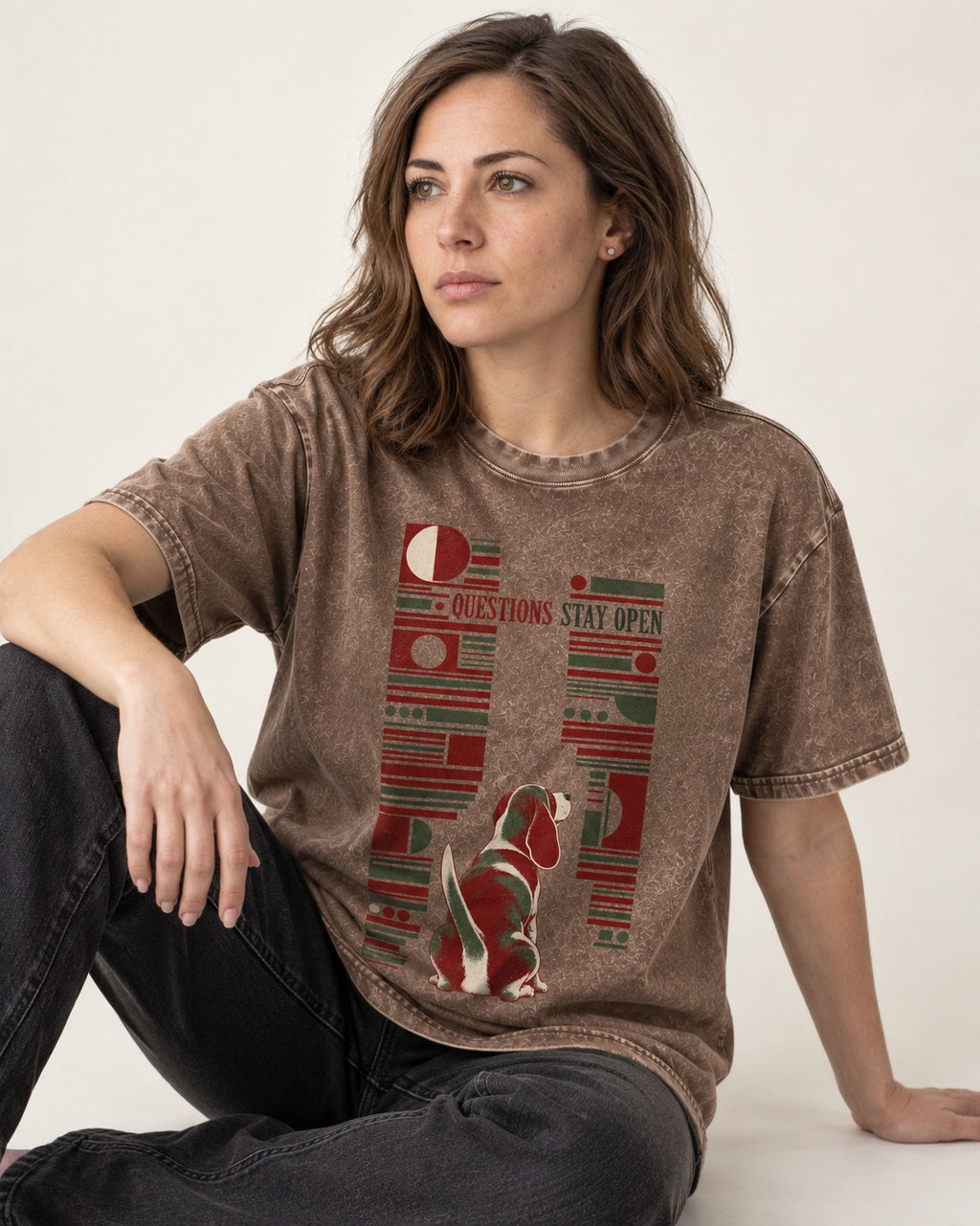 Beagle Questions Stay Open Washed Tee in Coffee, worn by a seated model