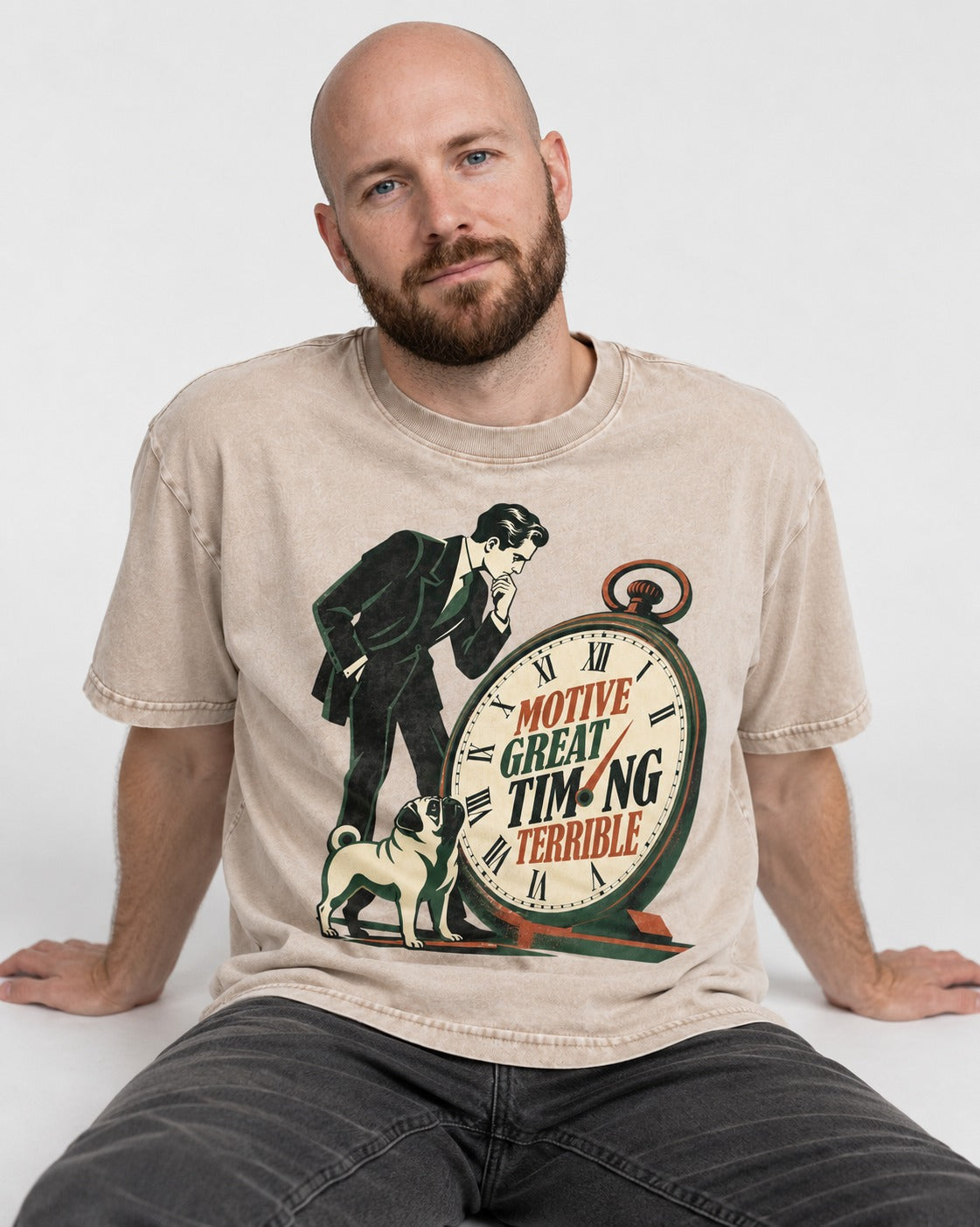 Pug Great Motive Terrible Timing Washed Tee in Apricot, worn by a seated model
