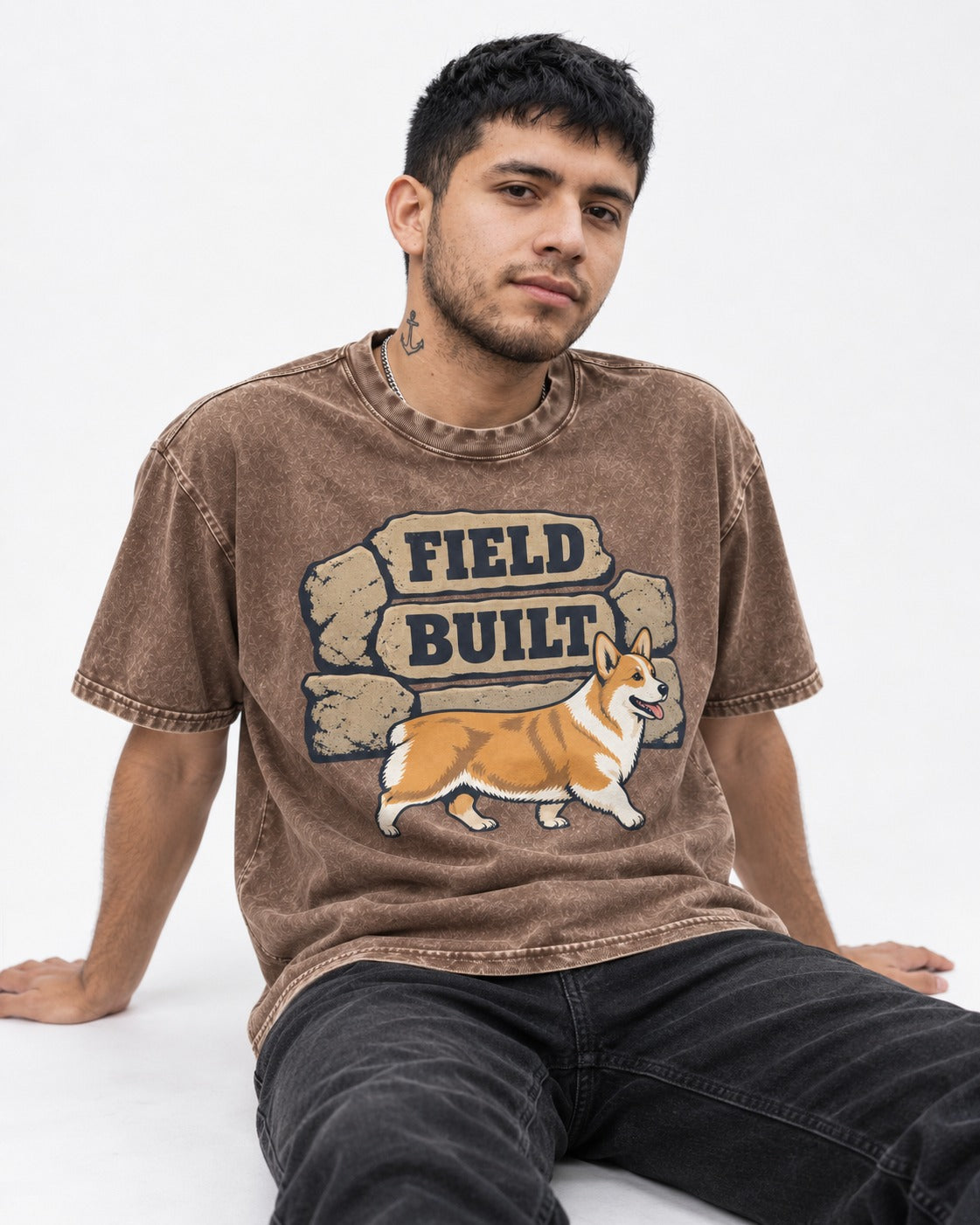 Field Built Corgi Washed Tee in Coffee, worn by a seated model