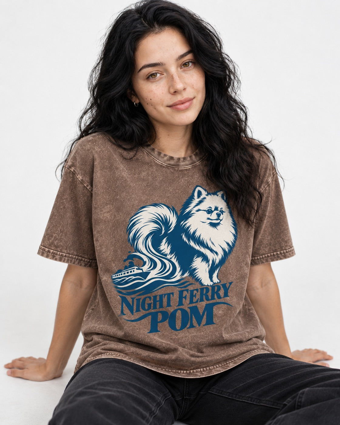 Night Ferry Pomeranian Washed Tee in Coffee, worn by a seated model