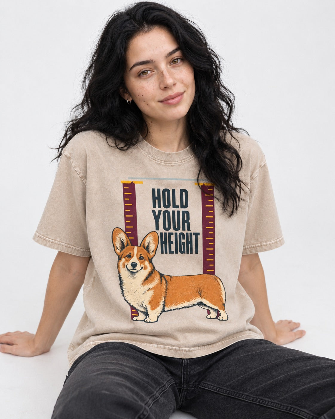 Corgi Hold Your Height Washed Tee in Apricot, worn by a seated model