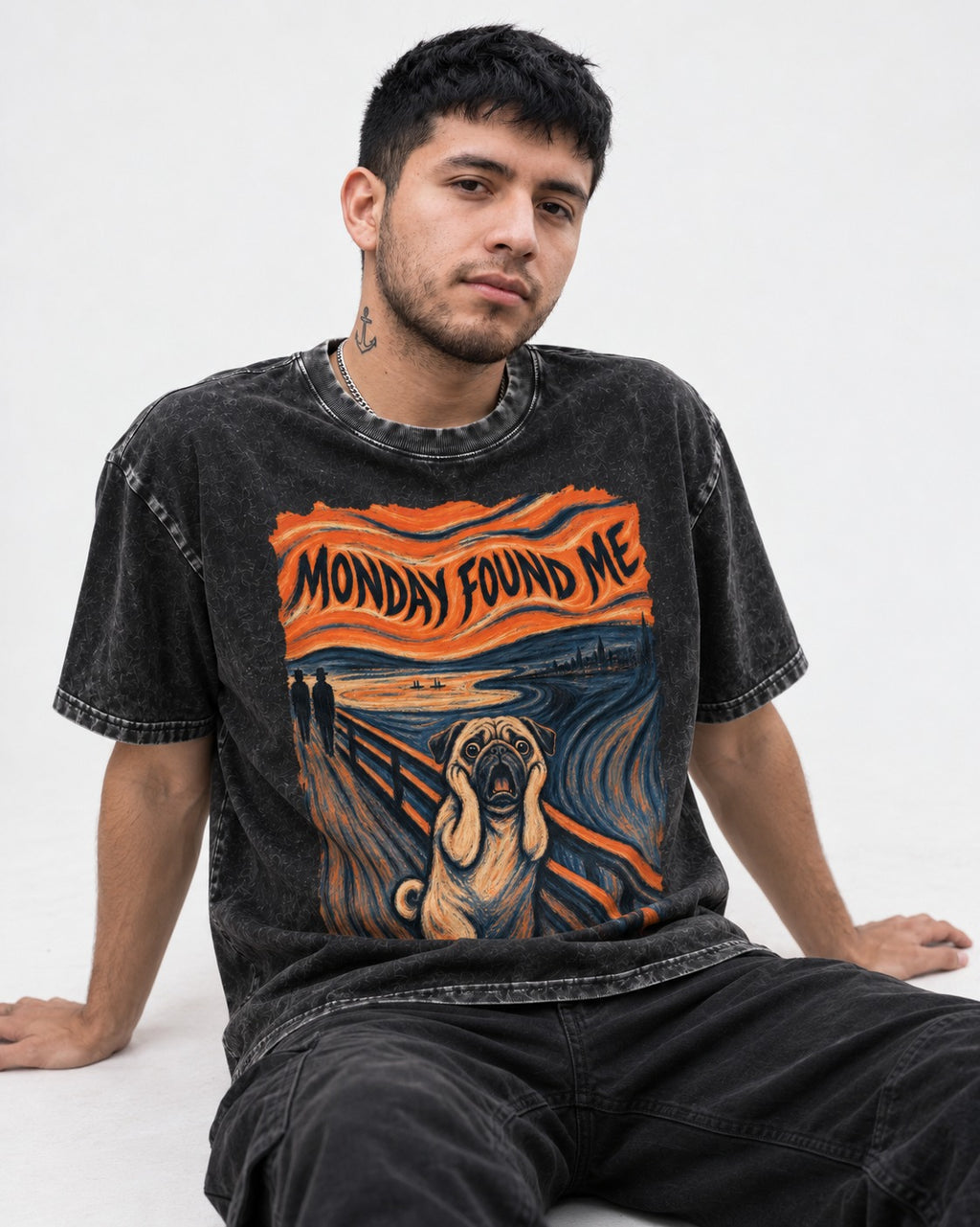 Pug Monday Found Me Scream Parody Graphic Washed Tee in Black, worn by a seated model