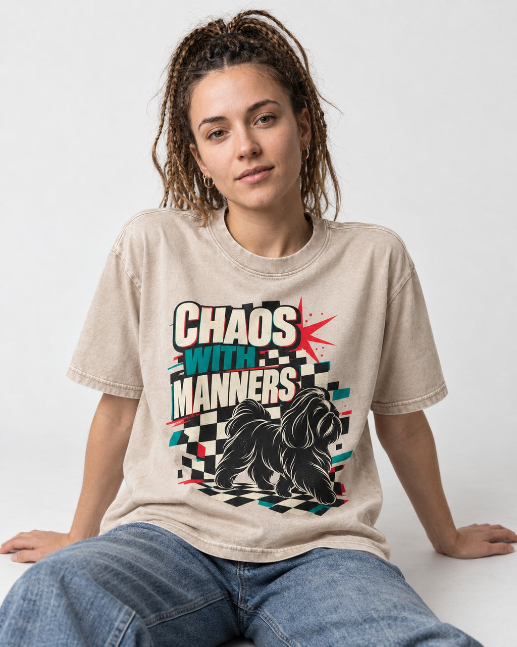 Shih Tzu Chaos with Manners Checkerboard Graphic Washed Tee in Apricot, worn by a seated model