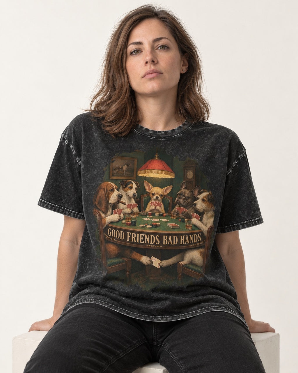 Good Friends Bad Hands Chihuahua Poker Scene Washed Tee in Black, worn by a seated model