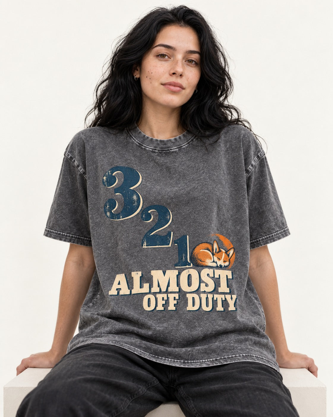 Corgi Almost Off Duty Washed Tee in Gray, worn by a seated model