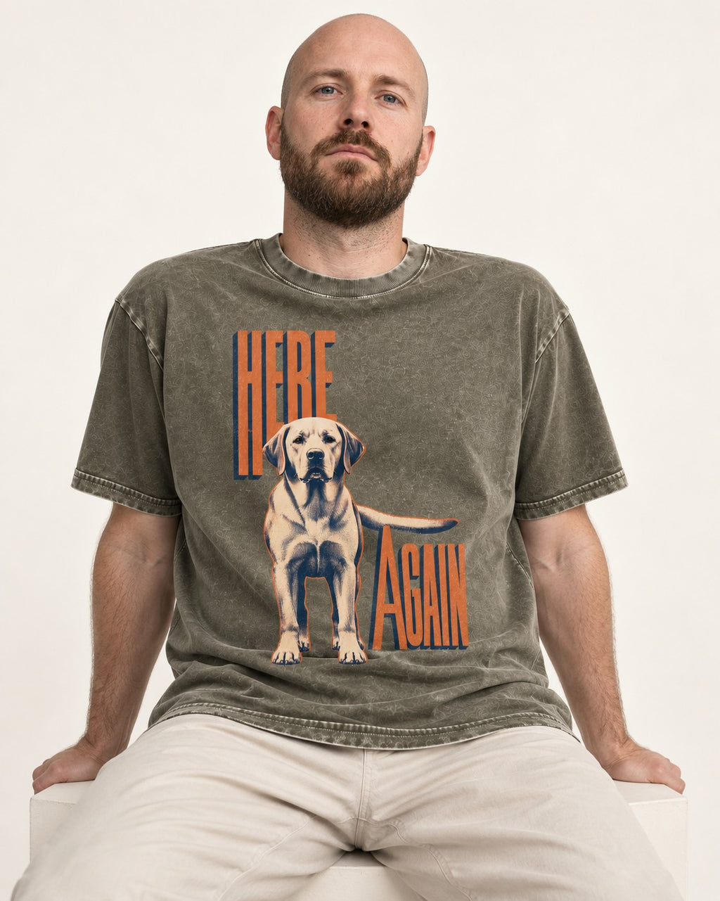 Labrador Retriever Here Again Standing Typography Graphic Washed Tee in Army Green, worn by a seated model