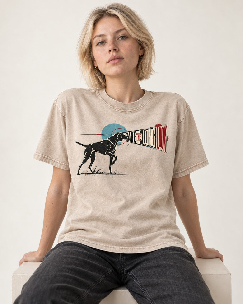 German Shorthaired Pointer Take the Long Look Washed Tee in Apricot, worn by a seated model