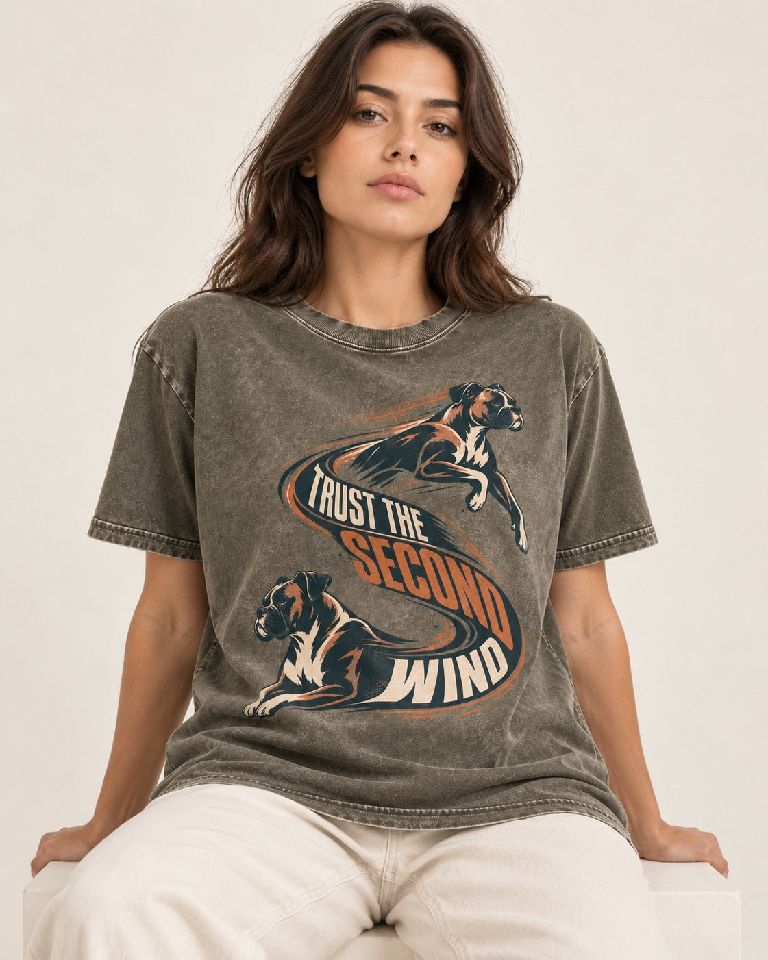 Trust the Second Wind Boxer Motion Graphic Washed Tee in Army Green, worn by a seated model