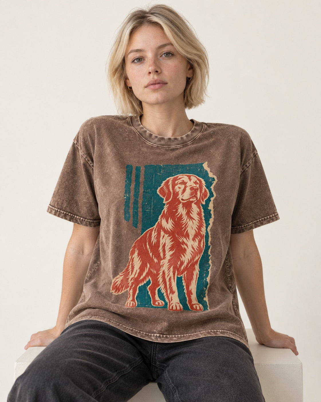 Golden Retriever Steadfast Heart Washed Tee in Coffee, worn by a seated model