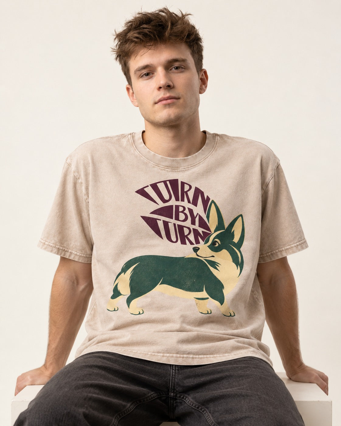 Turn by Turn Corgi Washed Tee in Apricot, worn by a seated model
