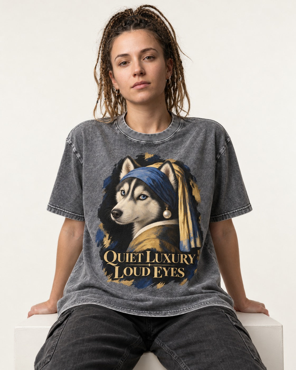 Husky Quiet Luxury Loud Eyes Pearl Portrait Graphic Washed Tee in Gray, worn by a seated model