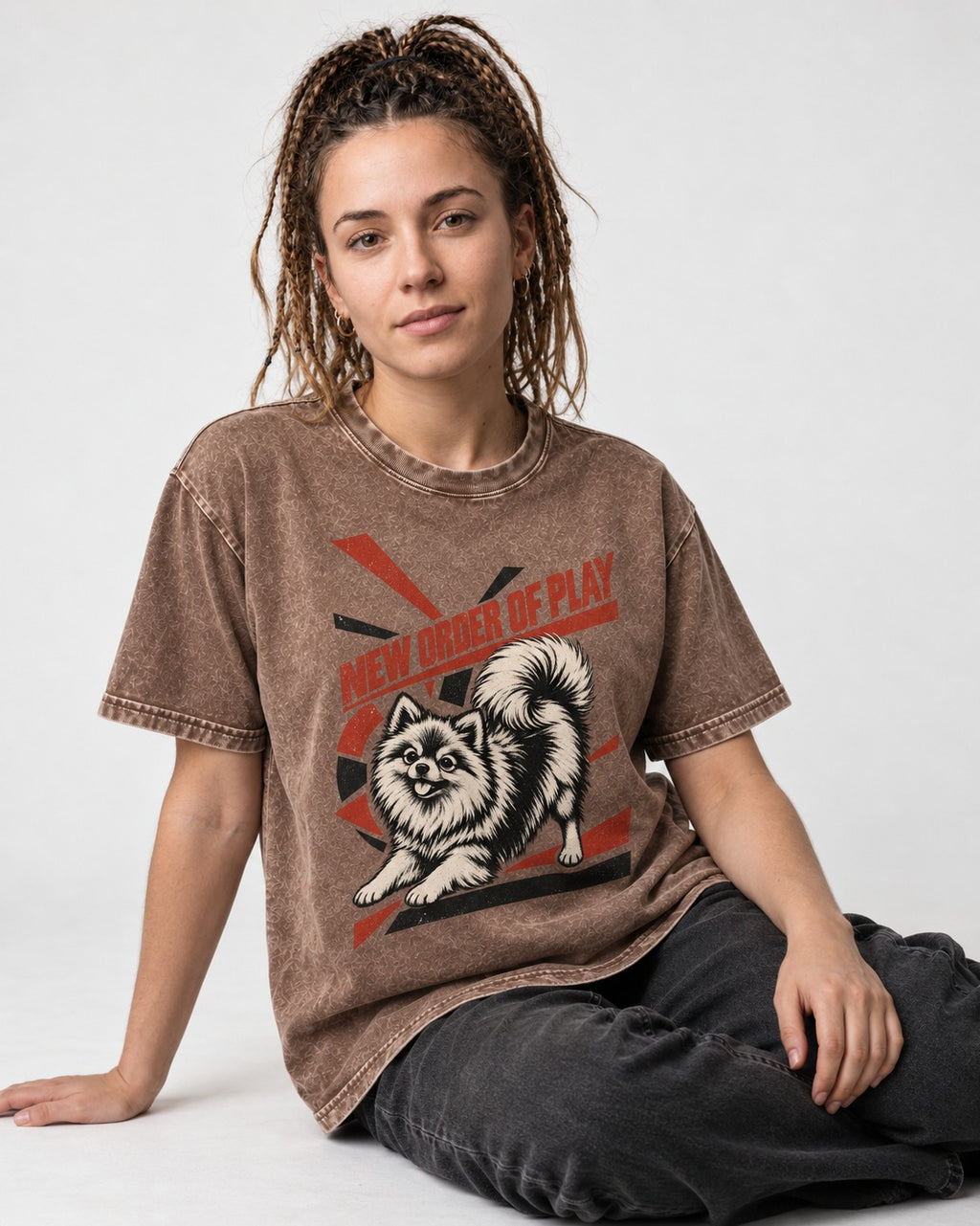 Pomeranian Order of Play Washed Tee in Coffee, worn by a seated model