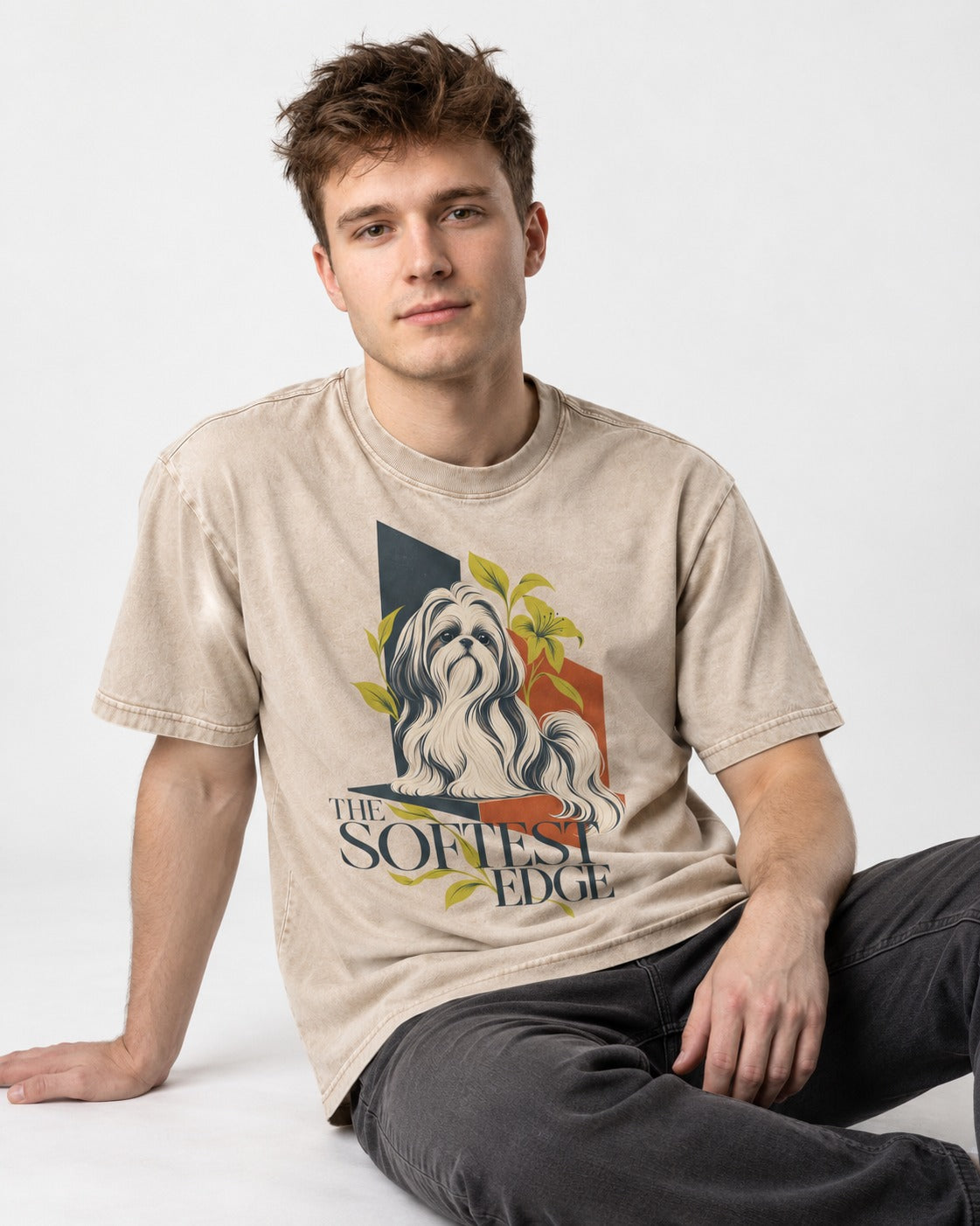 Shih Tzu The Softest Edge Washed Tee in Apricot, worn by a seated model