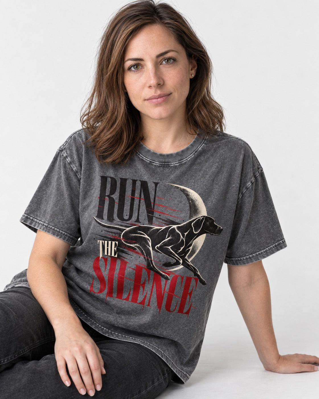 Run the Silence German Shorthaired Pointer Washed Tee in Gray, worn by a seated model
