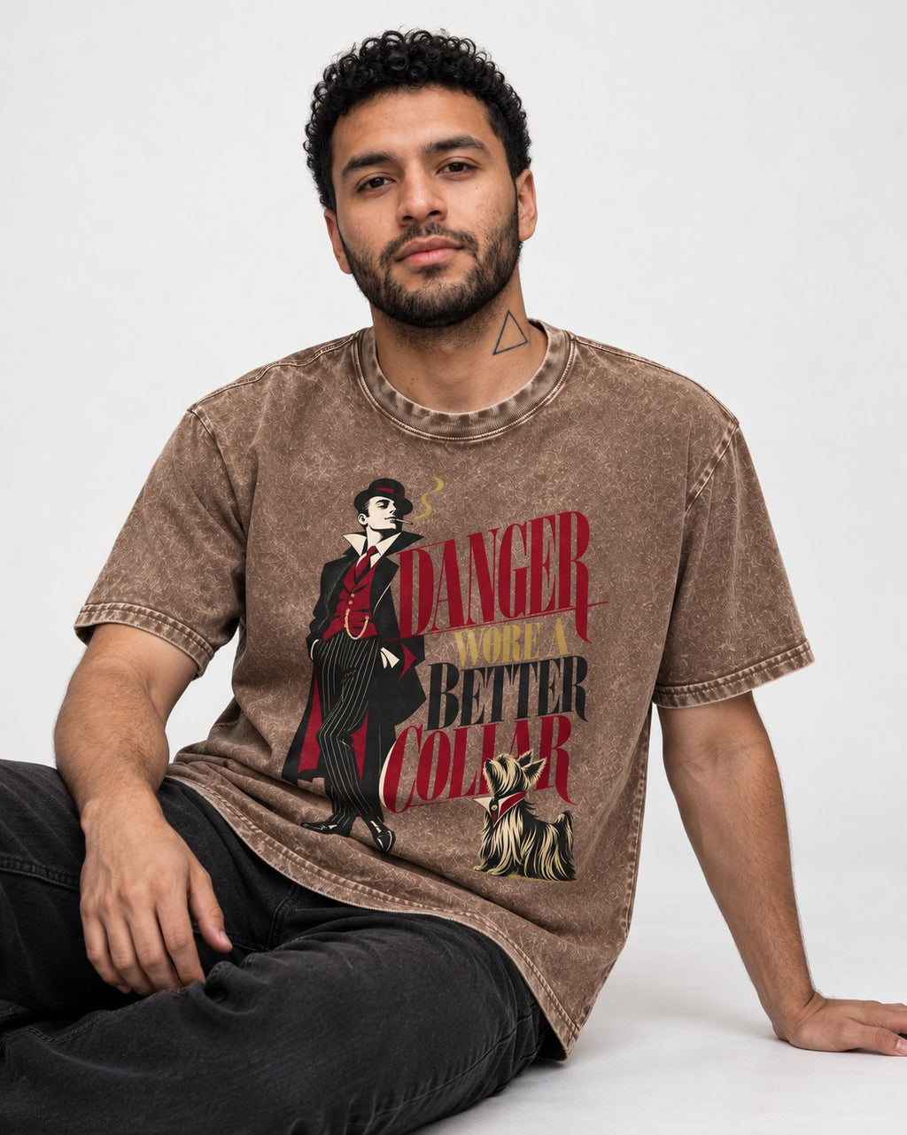 Yorkshire Terrier Danger Wore a Better Collar Art Deco Graphic Washed Tee in Coffee, worn by a seated model