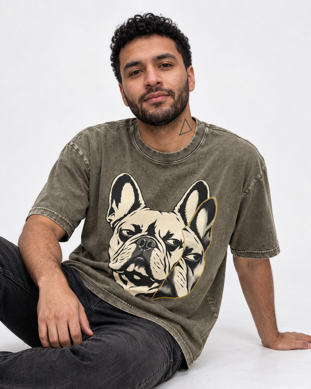 Frenchie Double Crop Side Eye Portrait Graphic Washed Tee in Army Green, worn by a seated model