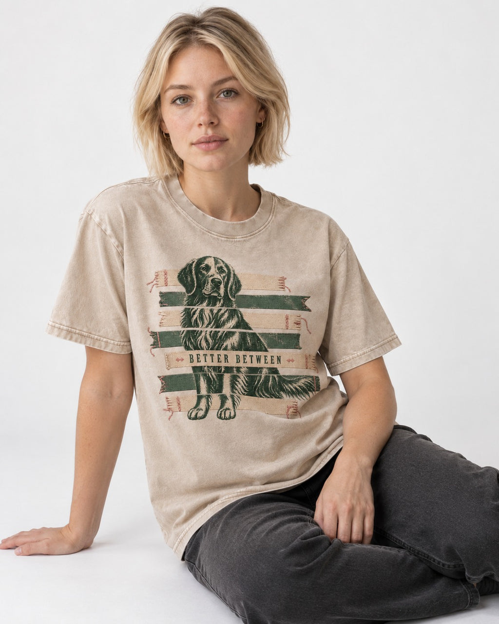 Golden Retriever Better Between Washed Tee in Apricot, worn by a seated model