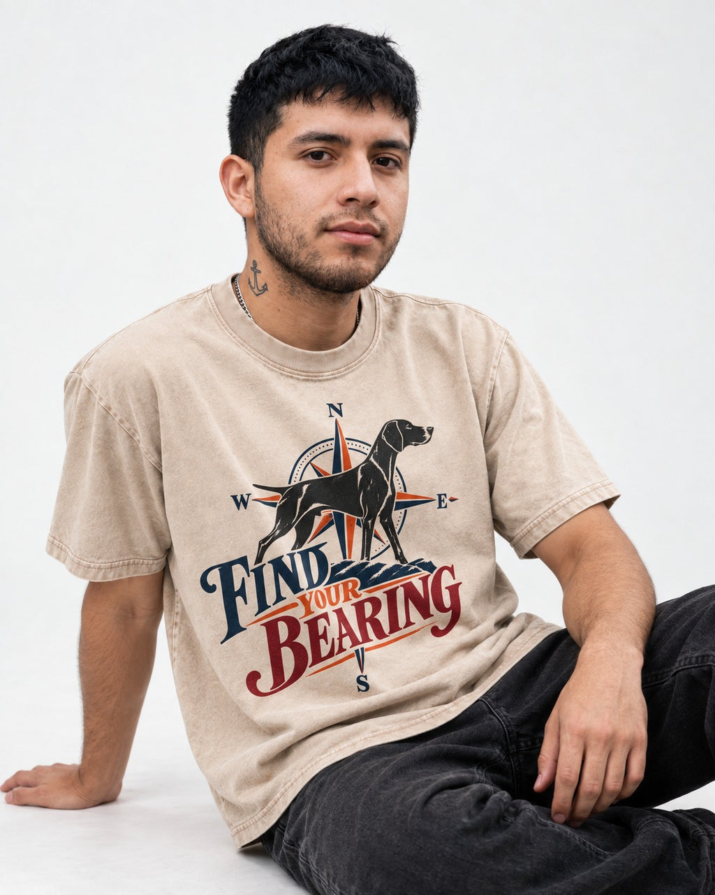 Find Your Bearing German Shorthaired Pointer Washed Tee in Apricot, worn by a seated model