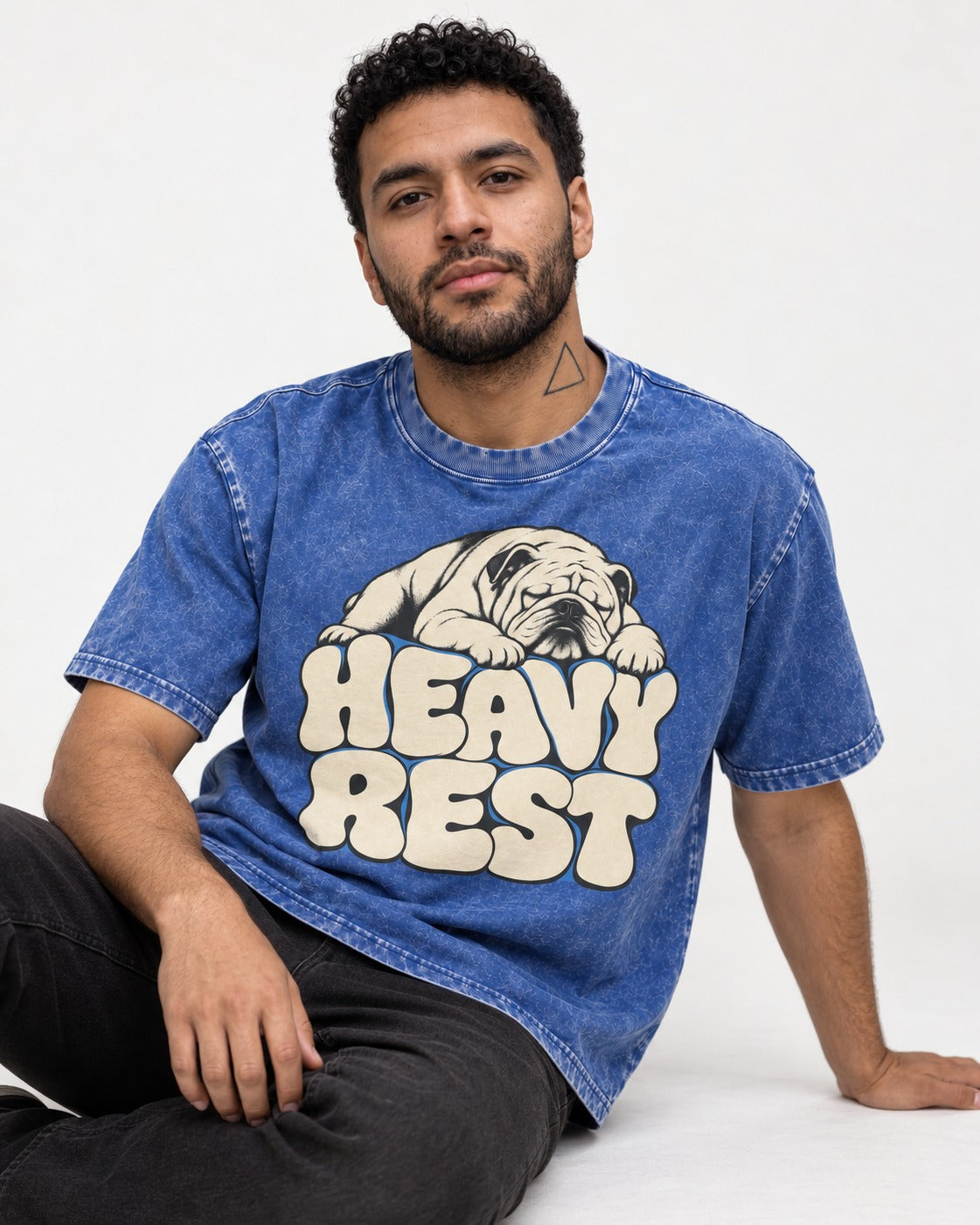 English Bulldog Heavy Rest Graphic Washed Tee in Royal Blue, worn by a seated model
