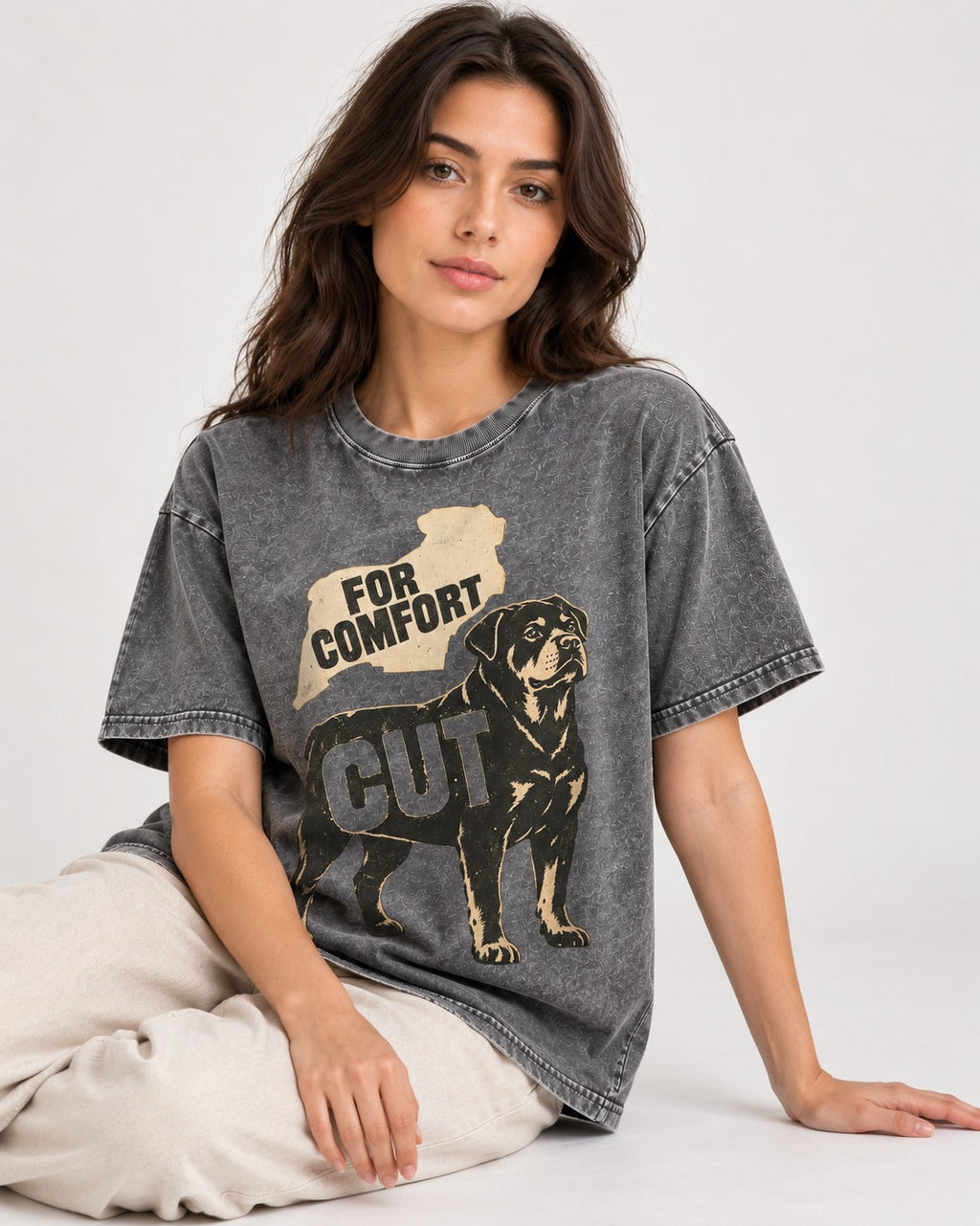 Rottweiler Cut for Comfort Washed Tee in Gray, worn by a seated model