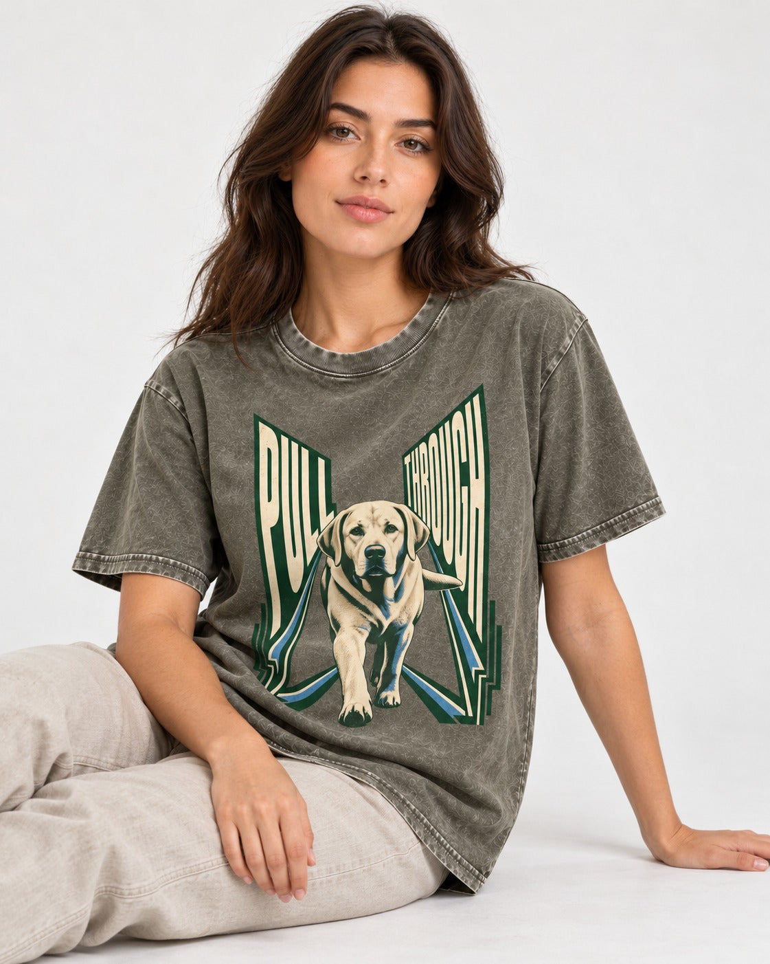 Labrador Retriever Pull Through Perspective Graphic Washed Tee in Army Green, worn by a seated model