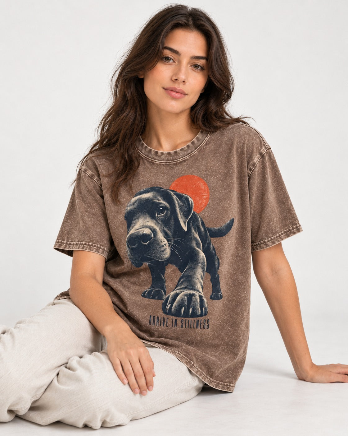 Labrador Retriever Arrive in Stillness Washed Tee in Coffee, worn by a seated model