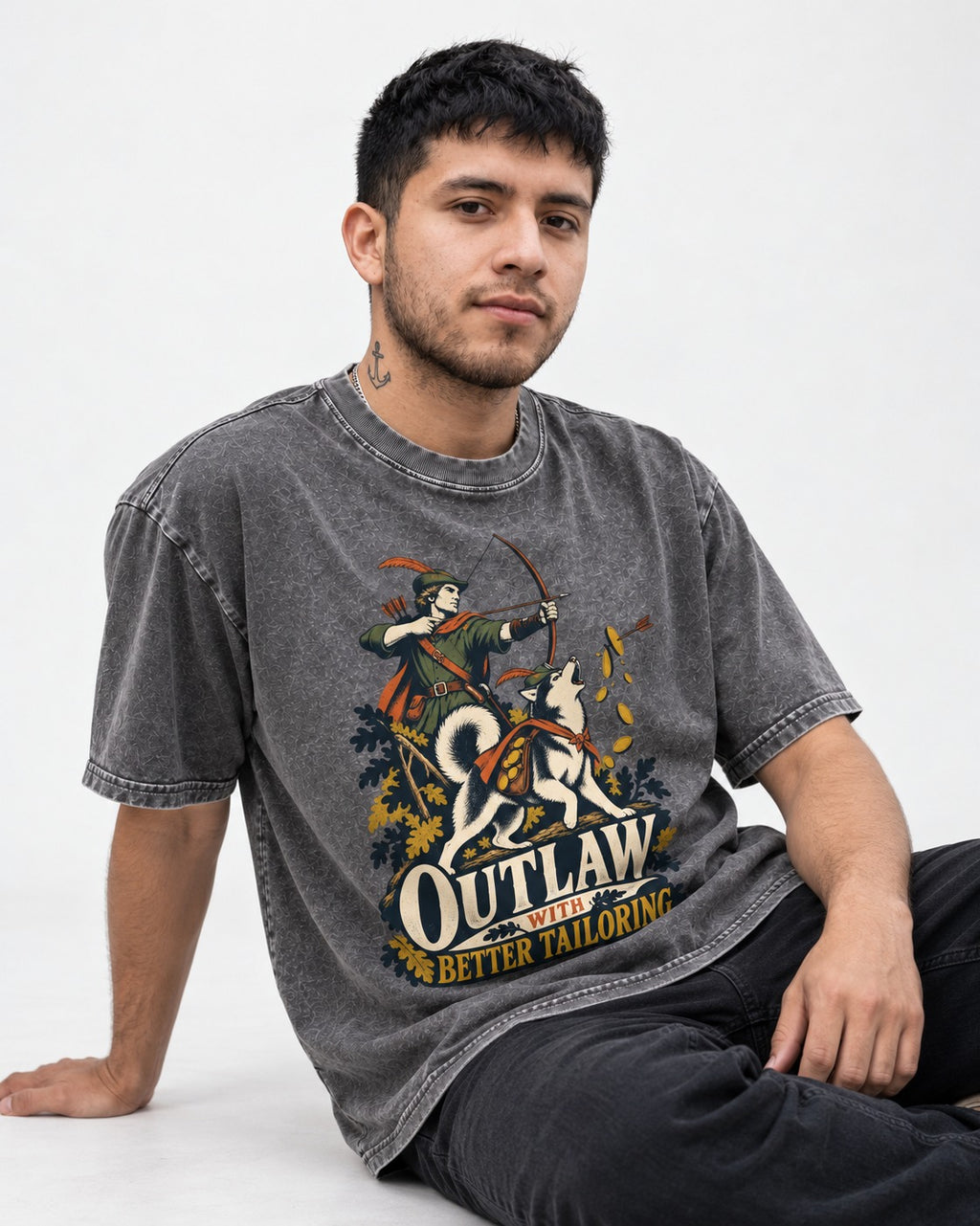 Husky Outlaw with Better Tailoring Washed Tee in Gray, worn by a seated model