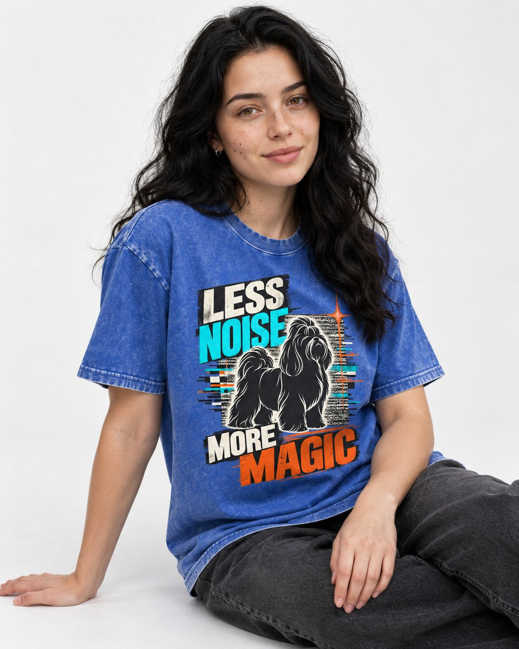Shih Tzu Less Noise More Magic Pop Art Graphic Washed Tee in Royal Blue, worn by a seated model