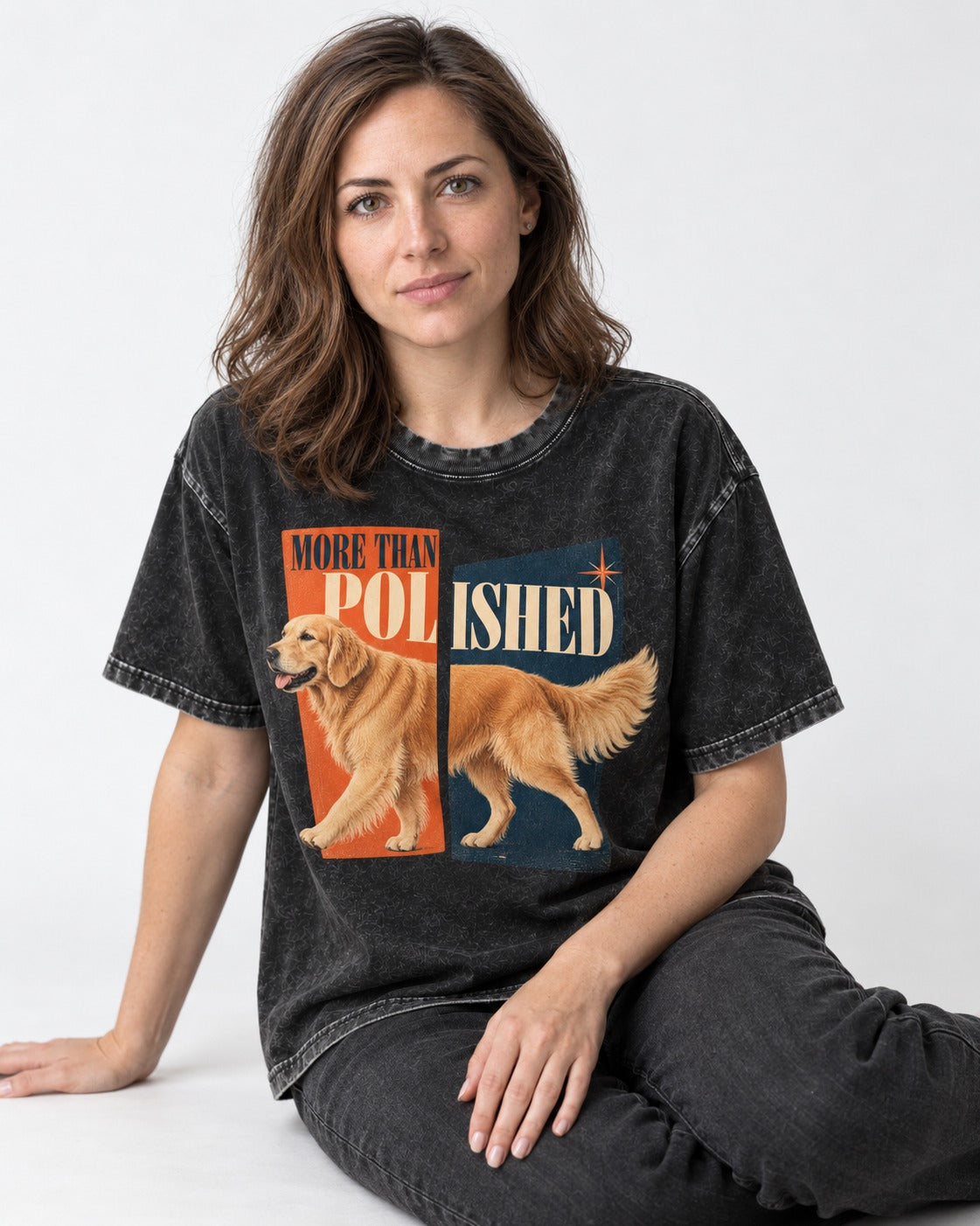 Golden Retriever More Than Polished Split Panel Graphic Washed Tee in Black, worn by a seated model
