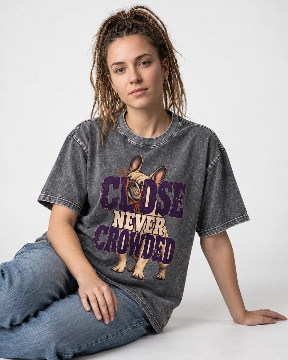 Frenchie Close Never Crowded Peekaboo Type Graphic Washed Tee in Gray, worn by a seated model