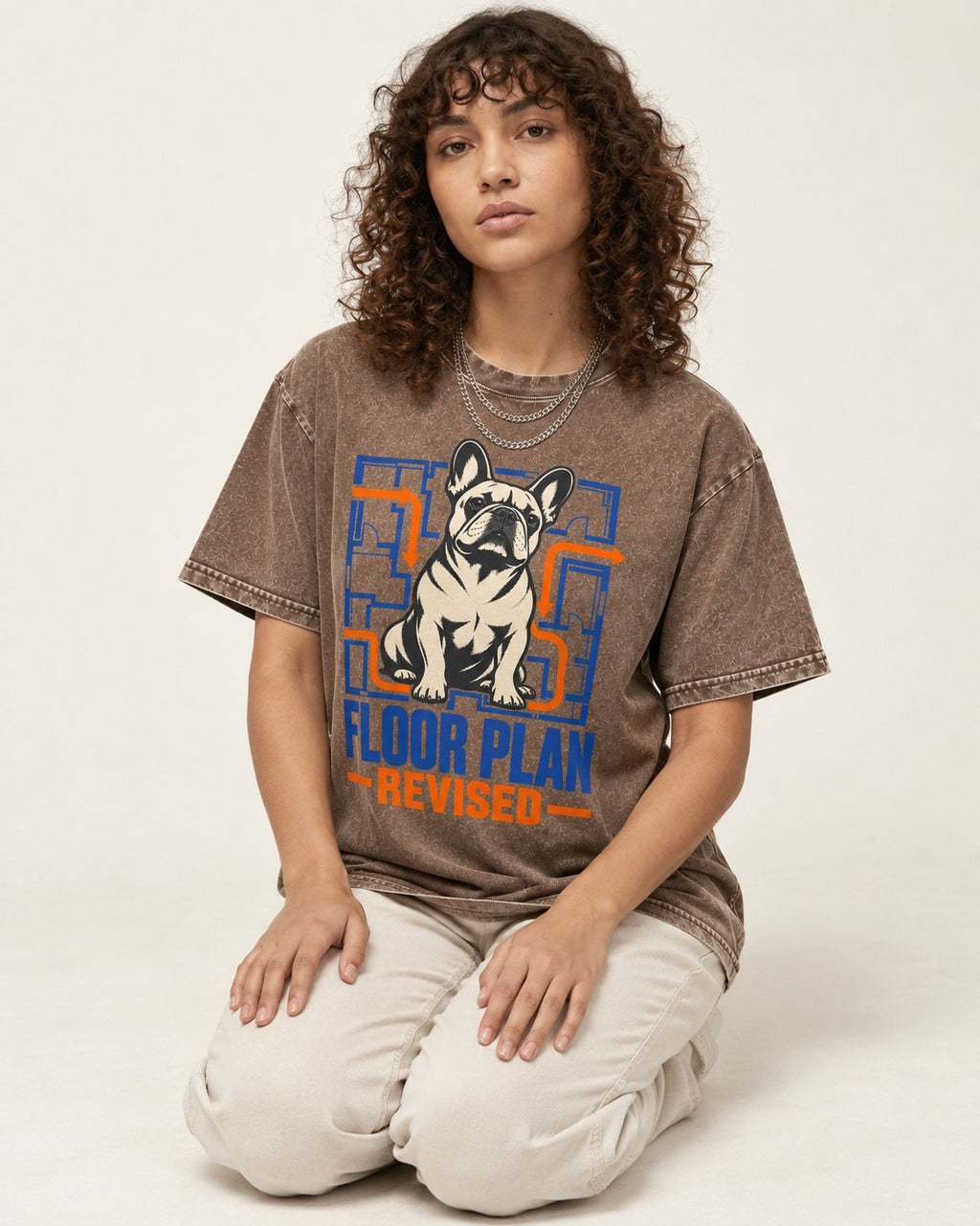 Frenchie Floor Plan Revised Washed Tee in Coffee, worn by a seated model