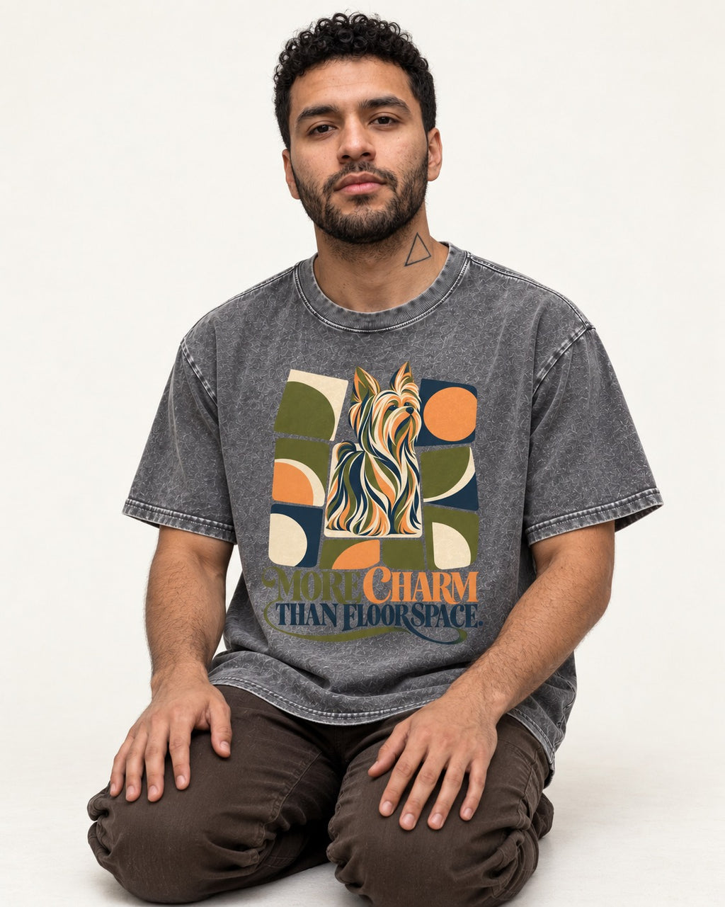 Yorkshire Terrier More Charm Than Space Washed Tee in Gray, worn by a seated model