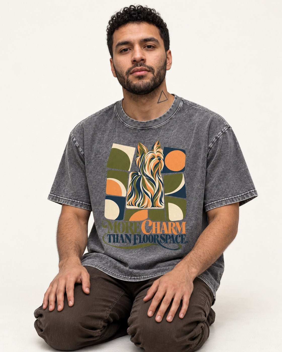Yorkshire Terrier More Charm Than Space Washed Tee in Gray, worn by a seated model