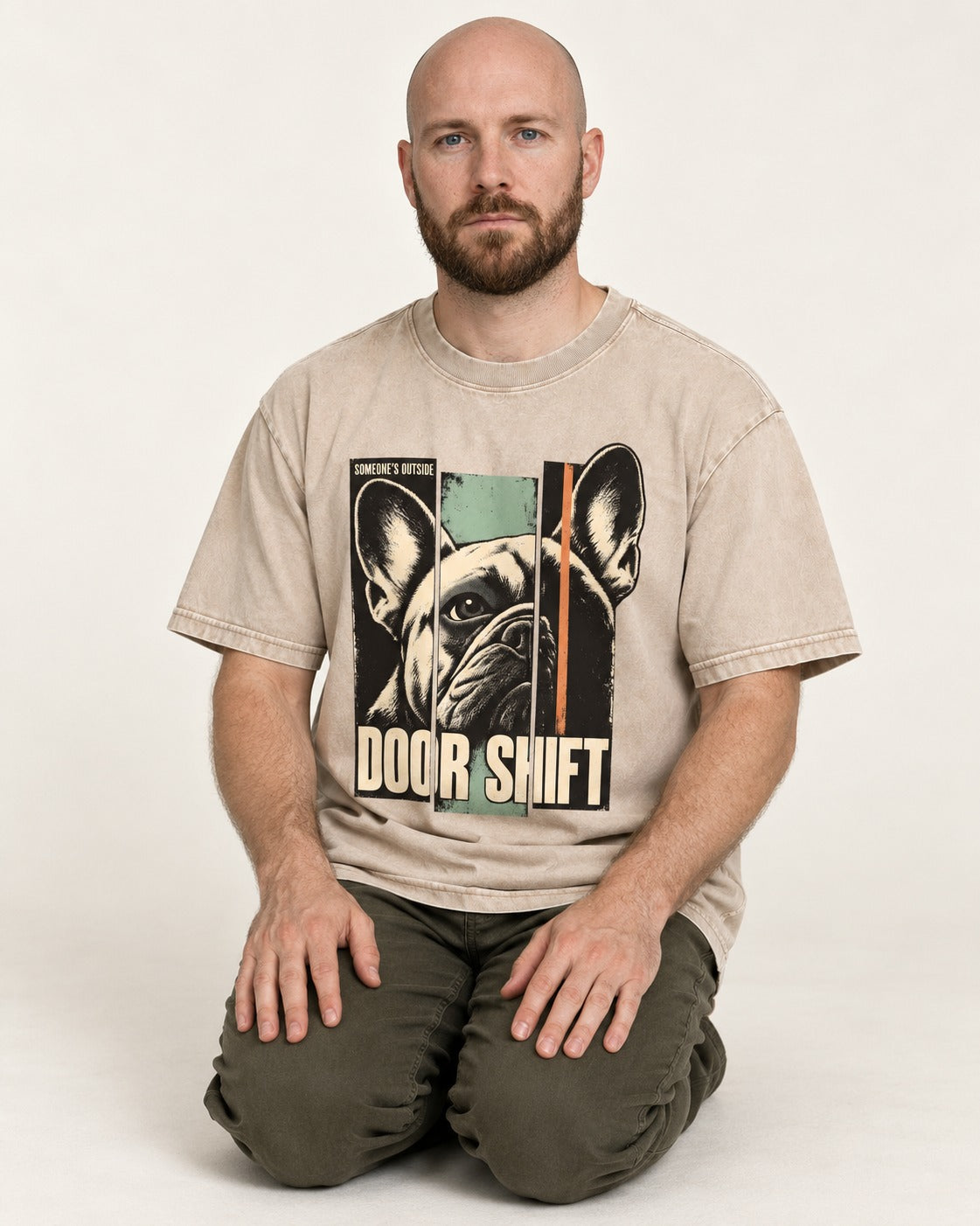 Frenchie Someone's Outside Door Shift Graphic Washed Tee in Apricot, worn by a seated model