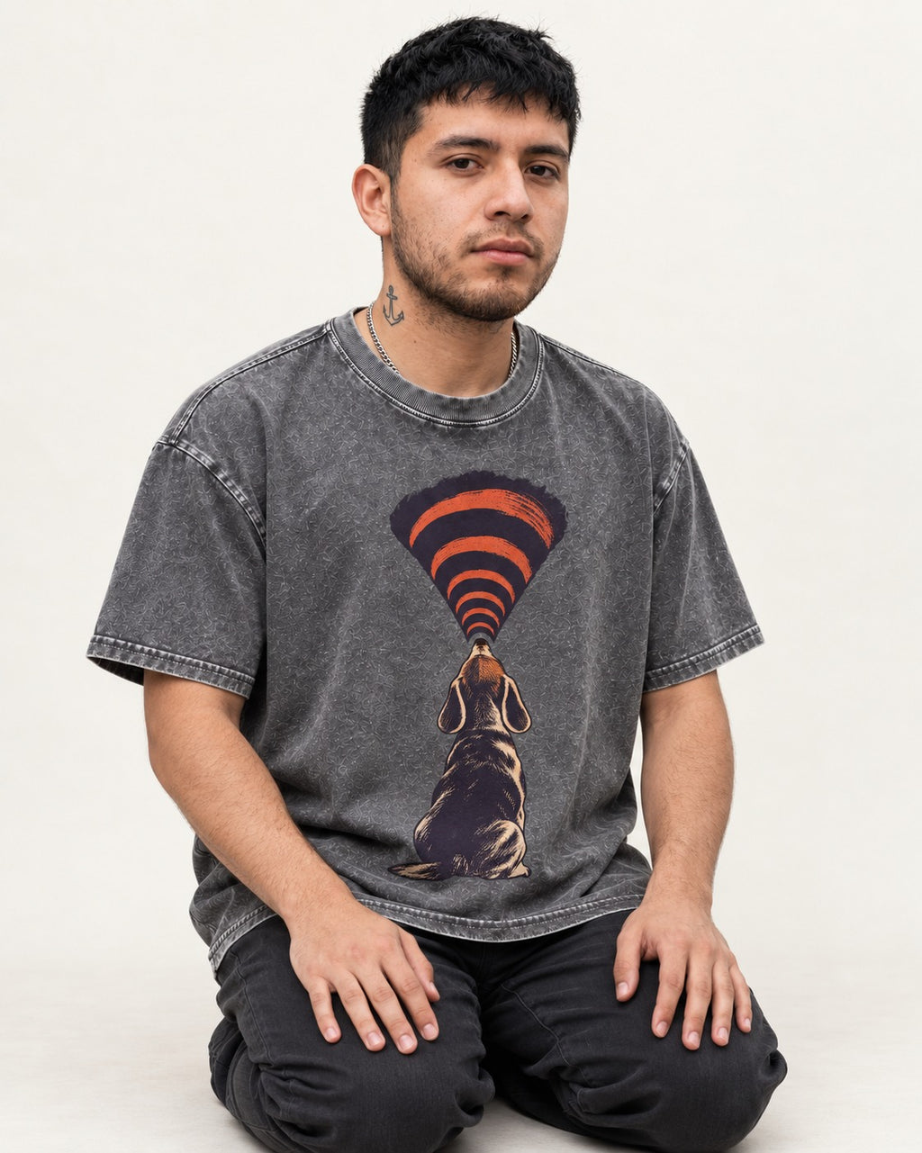 Beagle Broadcast Washed Tee in Gray, worn by a seated model