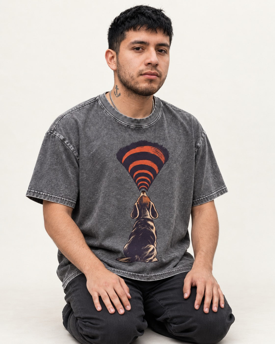 Beagle Broadcast Washed Tee in Gray, worn by a seated model