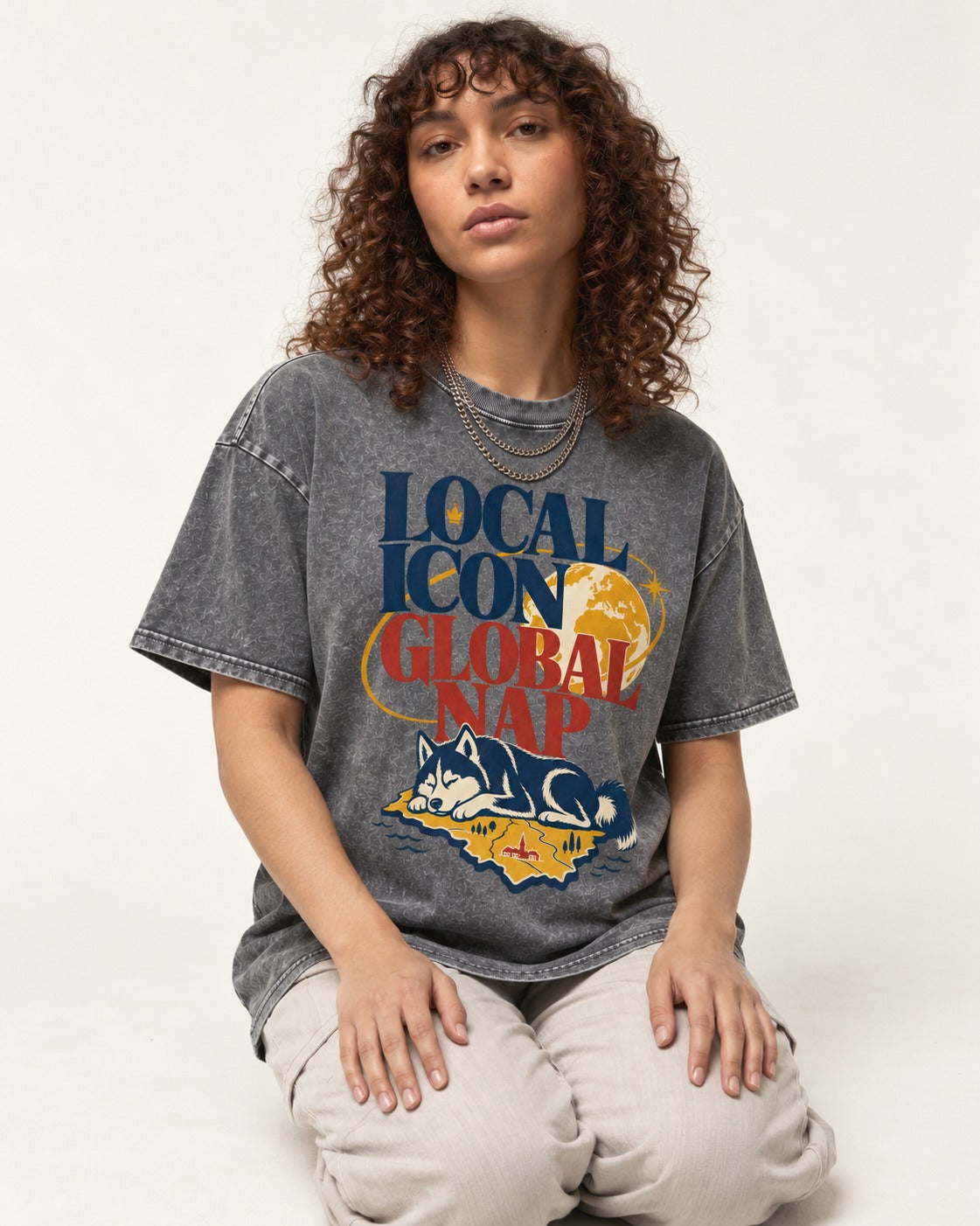 Husky Local Icon Global Nap Washed Tee in Gray, worn by a seated model