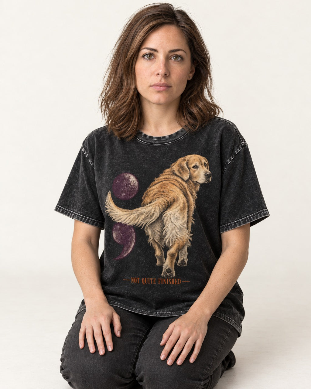 Golden Retriever Not Quite Finished Semicolon Graphic Washed Tee in Black, worn by a seated model