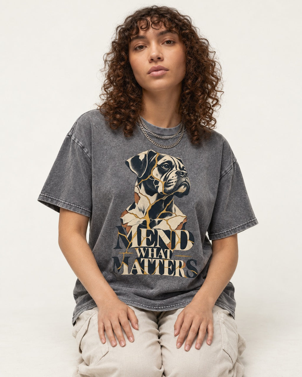 Mend What Matters Boxer Kintsugi Portrait Washed Tee in Gray, worn by a seated model